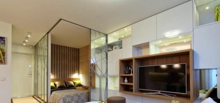 Interiør i en ett-roms leilighet: arrangement av komfortable og praktiske boliger