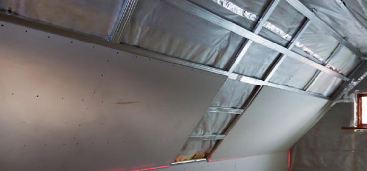 Stages of self-cladding an attic with plasterboard